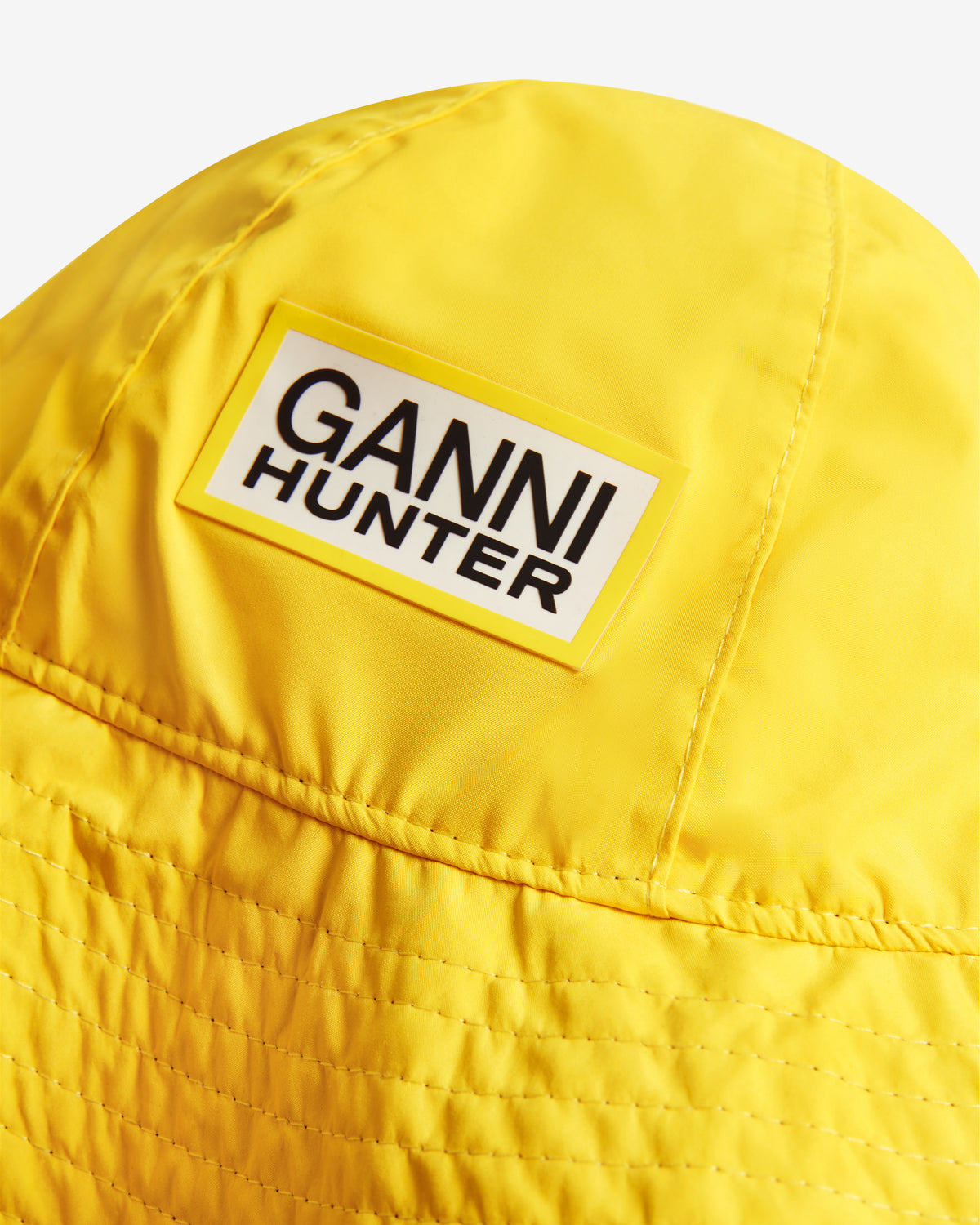 HUNTER UNISEX GANNI X HUNTER WATERPROOF BUCKET HAT LEMON