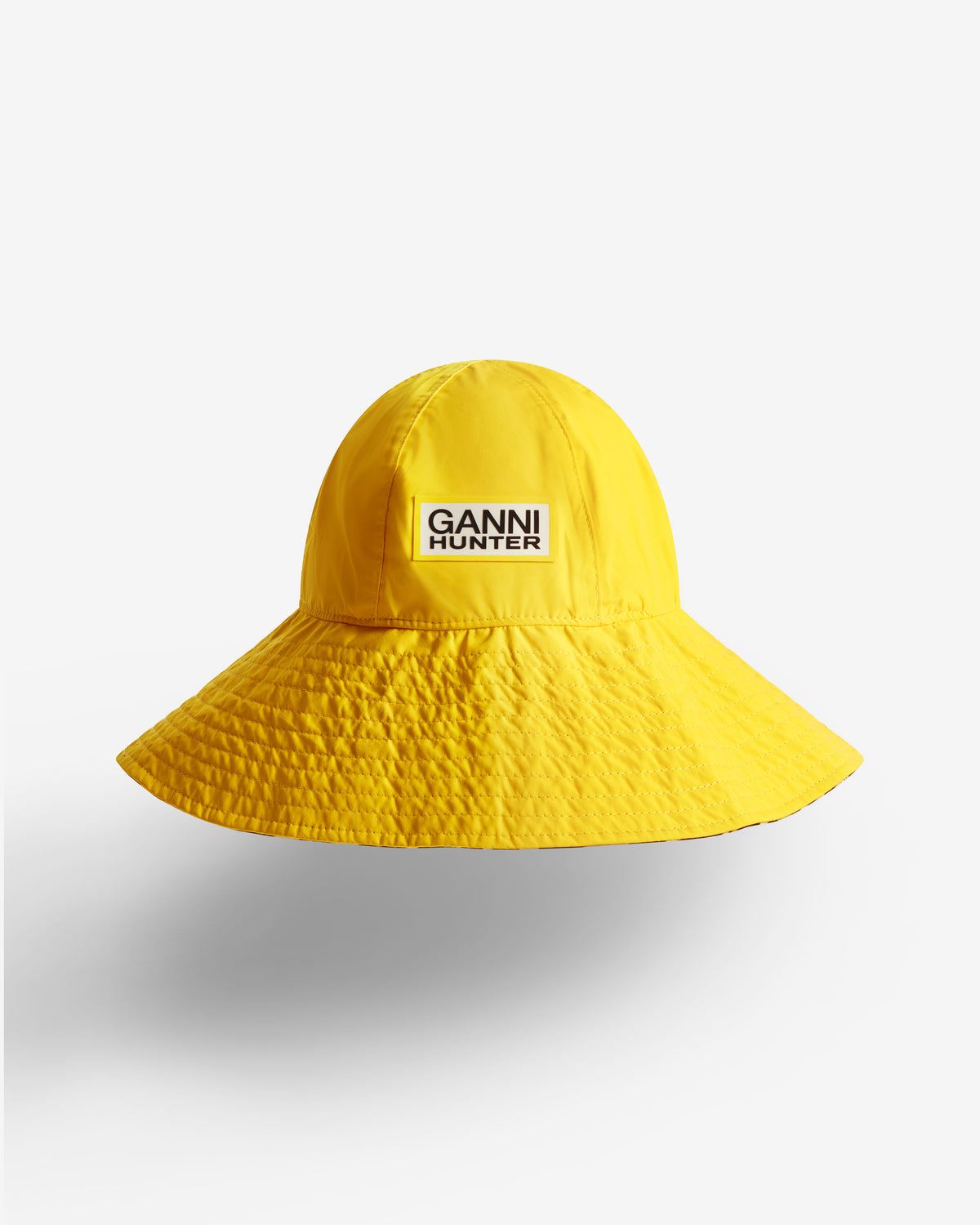 HUNTER UNISEX GANNI X HUNTER WATERPROOF BUCKET HAT LEMON